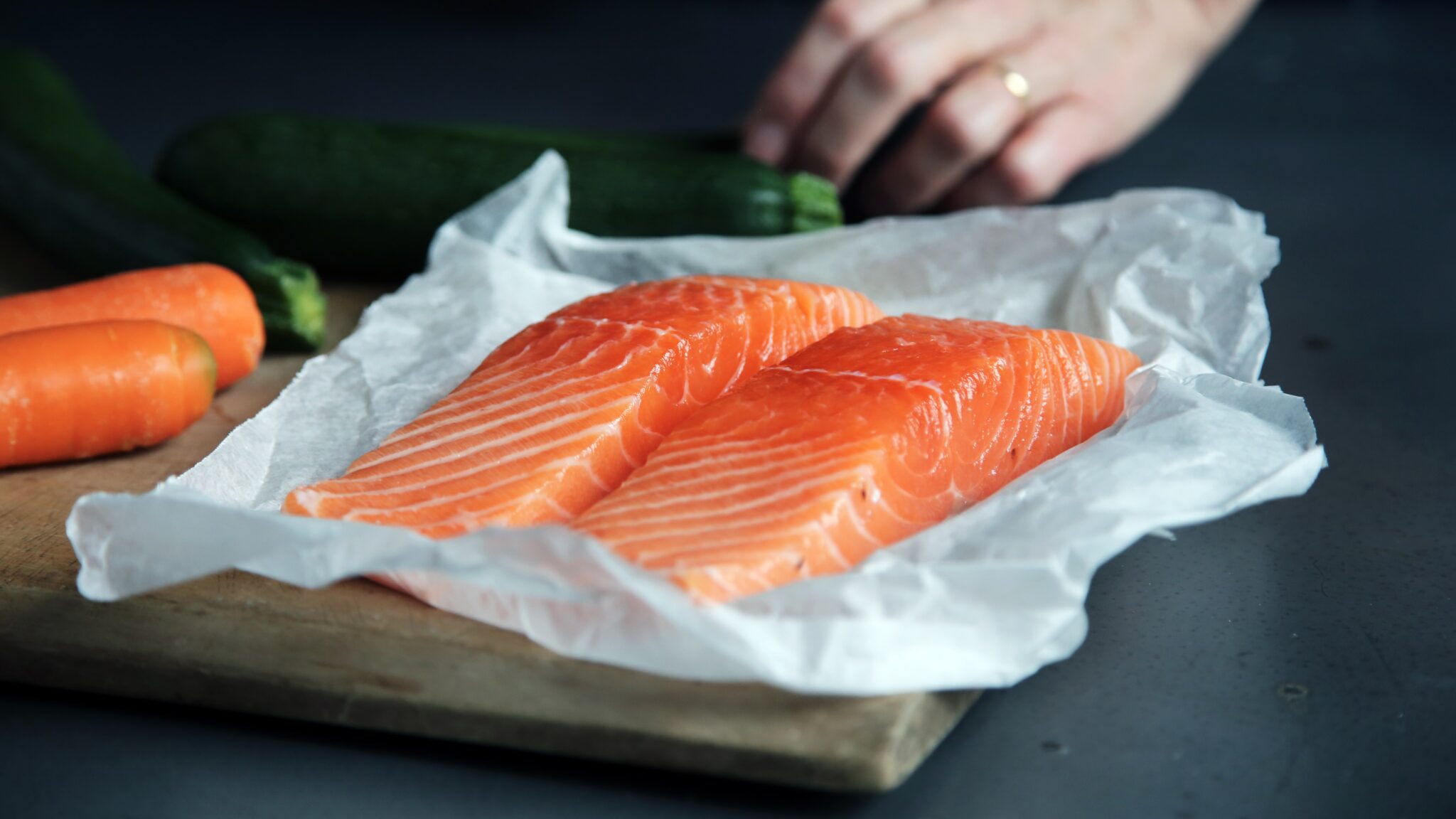 Raw Salmon on butcher board