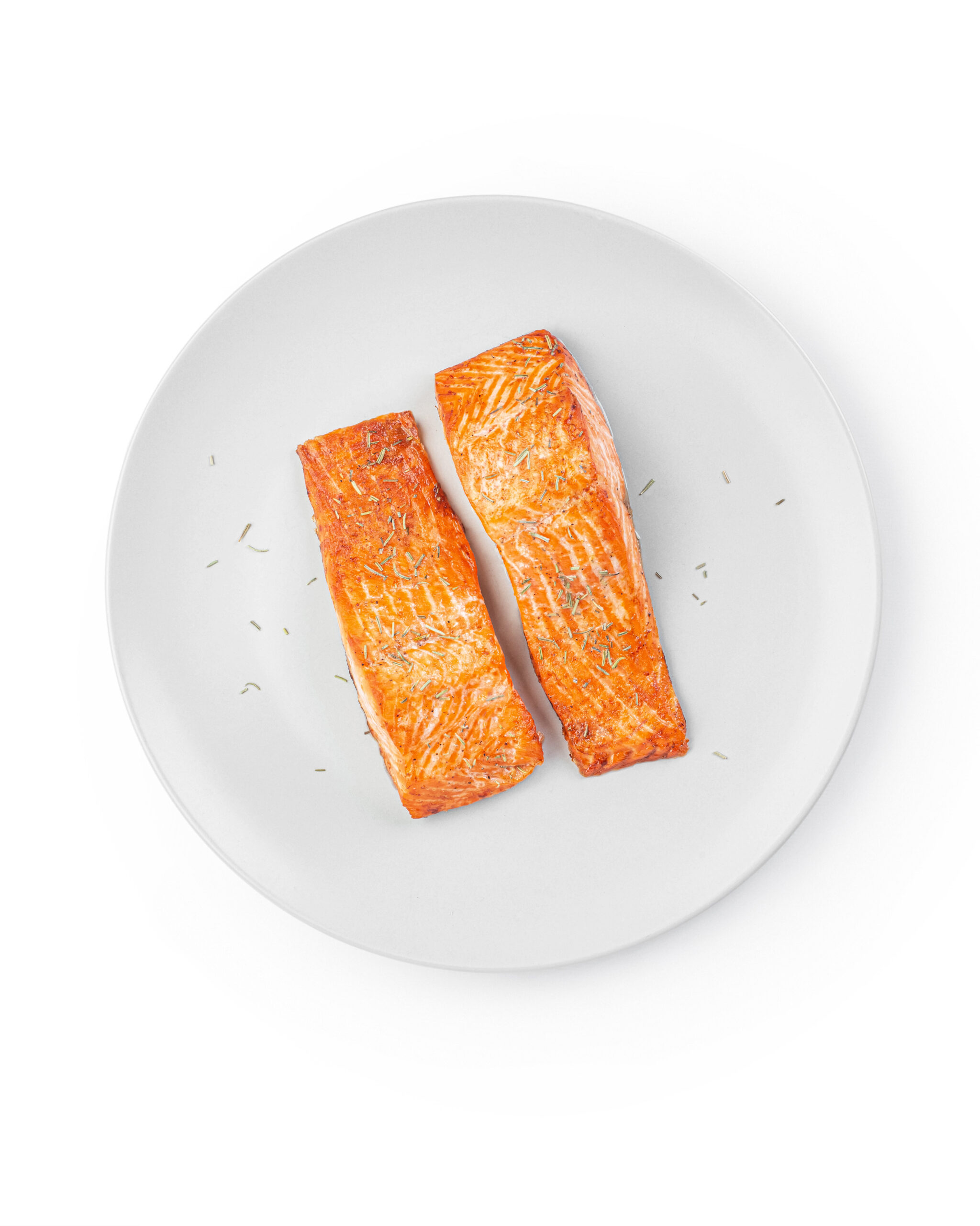seafood commodity update from dining alliance - crab on white plate white background